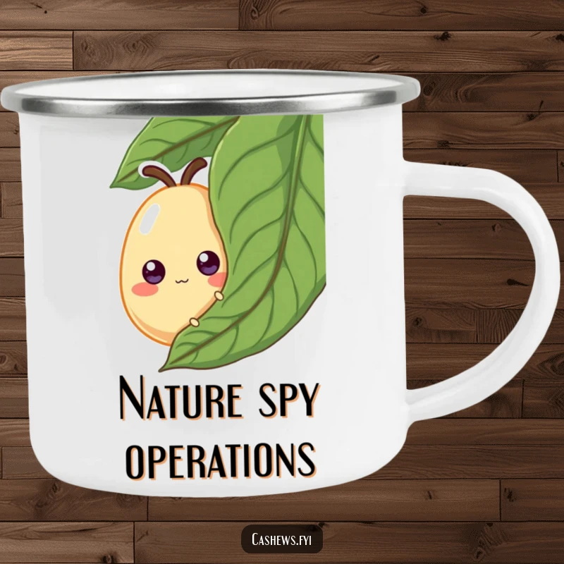 Funny Camping Mug: A cashew with googly eyes peeks from behind a leaf, a humorous and durable cup for outdoor enjoyment.
