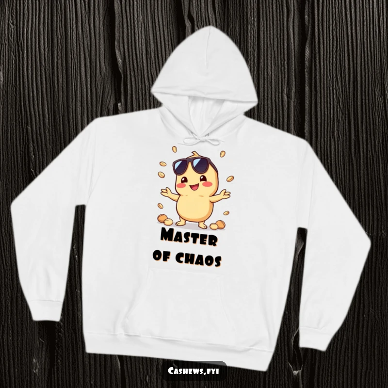 Funny hoodie depicting a kawaii cashew with sunglasses, skillfully juggling small nuts with an infectious grin, radiating fun.