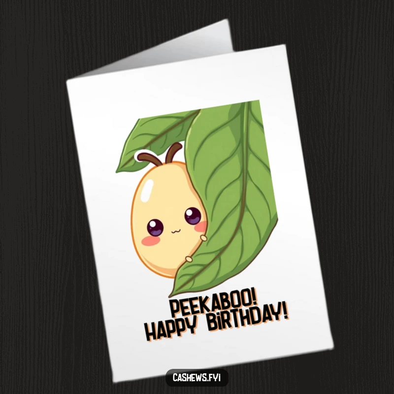Funny Free Printable Birthday Card: A cashew with googly eyes curiously peeking from behind a large green leaf, full of playful mischief.