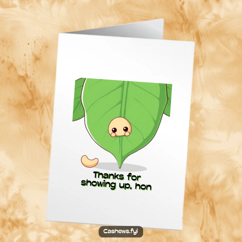 Funny Free Printable Thank You Card: A cashew nut peeks out coyly from behind a giant cashew leaf.