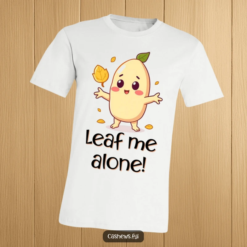 Funny t-shirt depicting a kawaii cashew character with arms out, eyes wide in surprise at a falling autumn leaf.