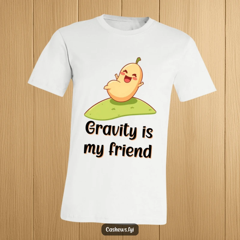 Funny T-Shirt: A cartoon cashew with a huge grin joyfully rolls down a grassy hill, radiating pure excitement.